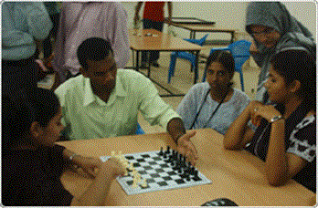 Students playing chess during sports day